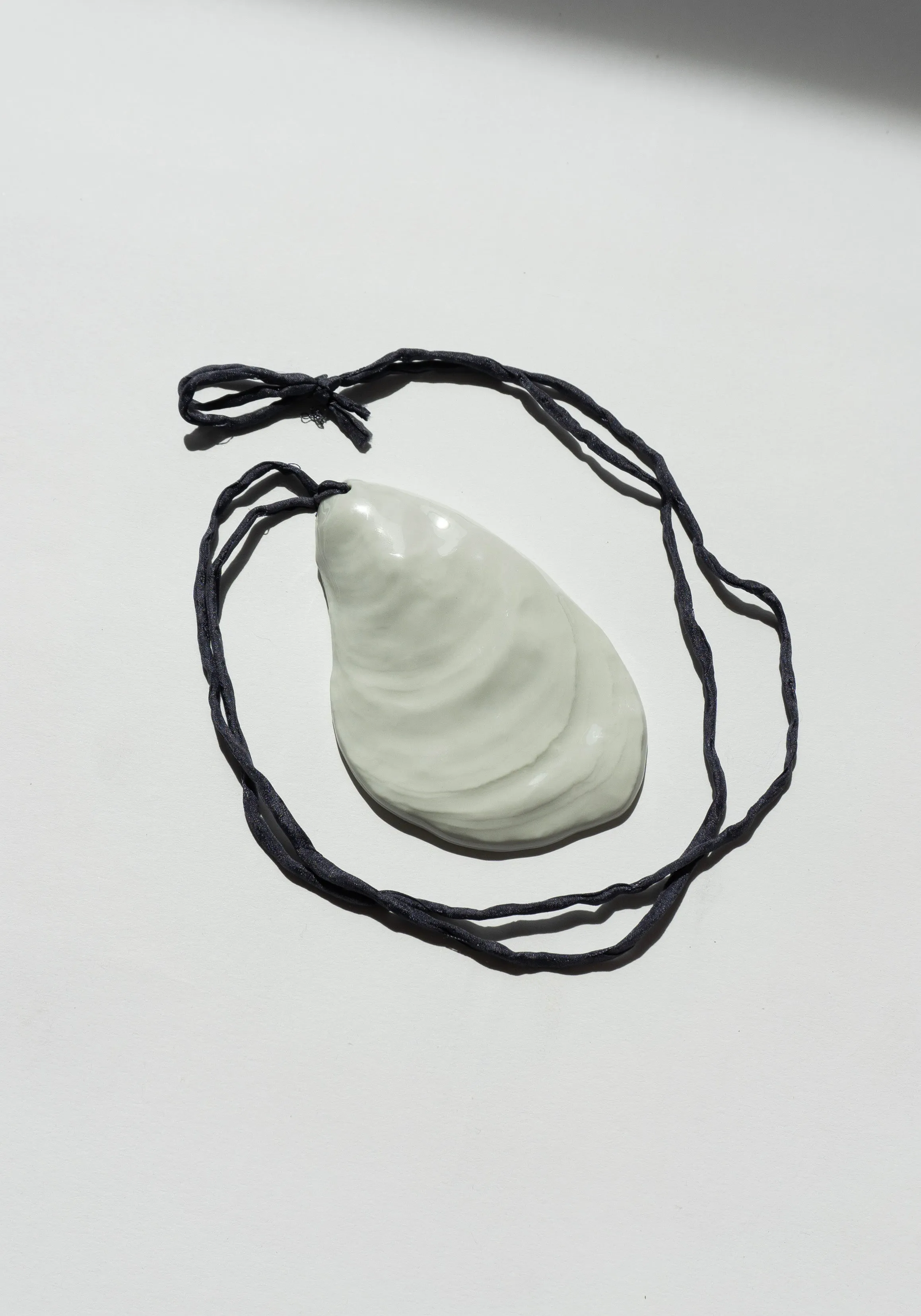 Oyster Amulet .05 Pendant